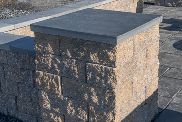 concrete block pillar topped with slate flagstone
